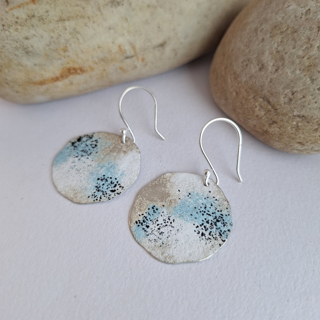 Sterling silver statement earring with powdercoat in blue, white and black to look like lichens.