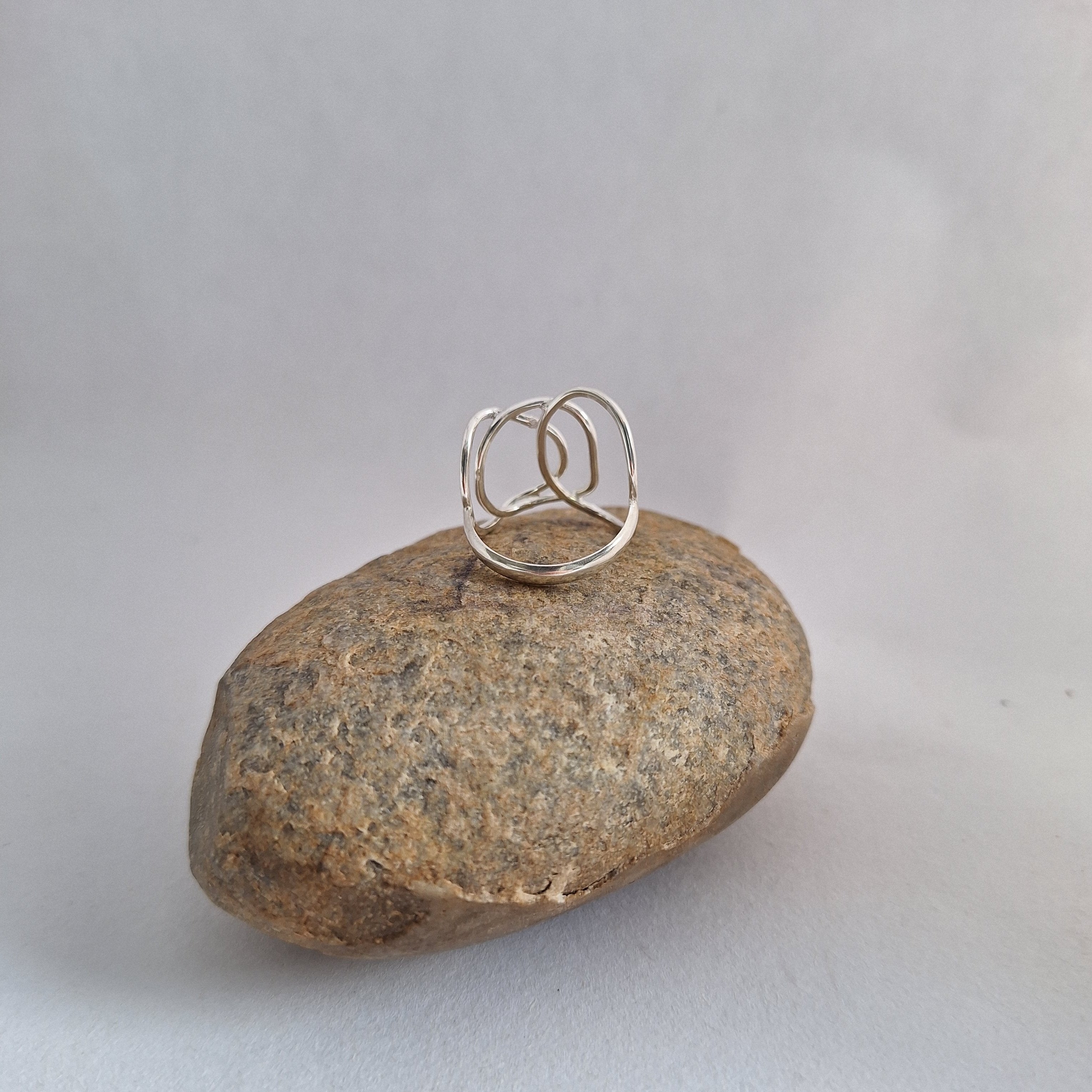 Sterling Silver Beach Boulder ring in sterling silver on rock.