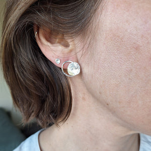 Sterling Silver Beach Boulder shaped stud earring in sterling silver on ear.