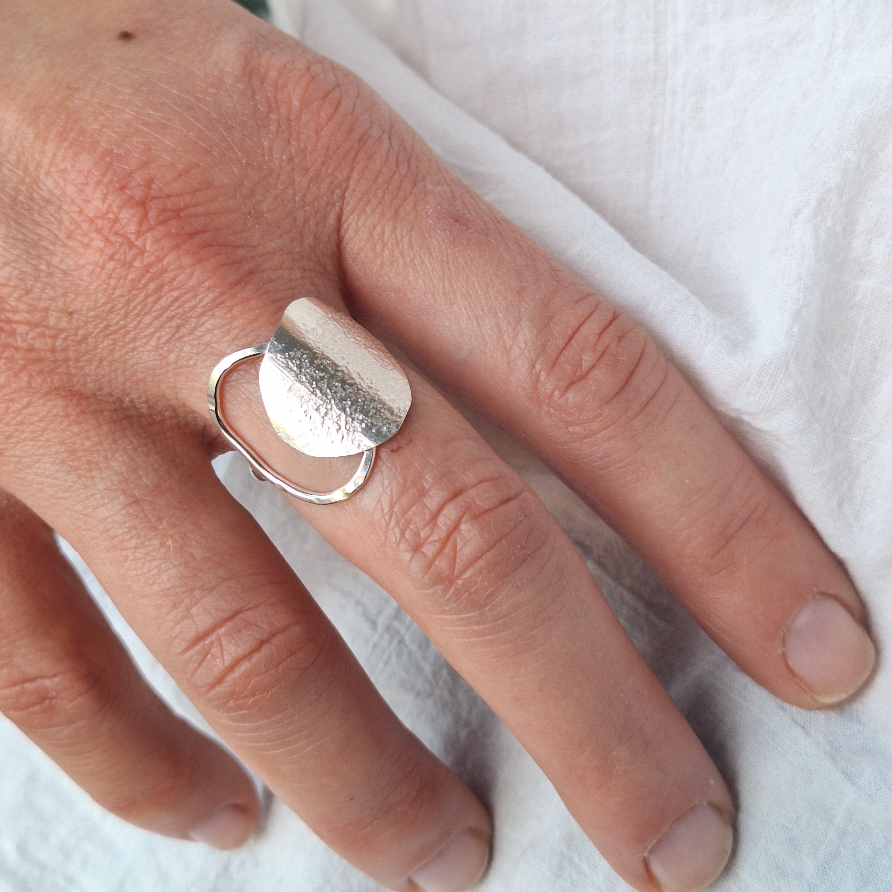 Sterling Silver Beach Boulder ring in sterling silver on hand.