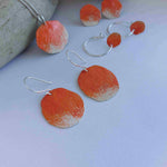 Load image into Gallery viewer, Sterling silver dangle earrings with a rock texture, organic shape and orange powder coat inspired by the lichens of the Bay of fires. Adjustable chain. Handmade in Tasmania by Karen Visagie from Hulley Jewellery

