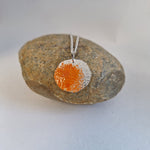 Load image into Gallery viewer, Sterling silver necklace with a rock texture and orange powder coat inspired by the lichens of  the Bay of fires. Adjustable chain. Handmade in Tasmania by Karen Visagie from Hulley Jewellery
