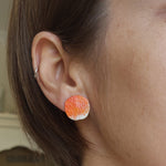 Load image into Gallery viewer, Sterling silver stud earrings with a rock texture and orange powder coat inspired by the lichens of the Bay of fires. Adjustable chain. Handmade in Tasmania by Karen Visagie from Hulley Jewellery

