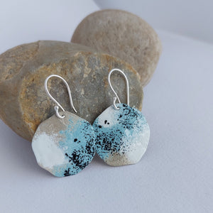 Sterling Silver beach rock lichen inspired dangle earrings with blue, white and black powder coating. Handmade in Tasmania by Karen Visagie from Hulley Jewellery