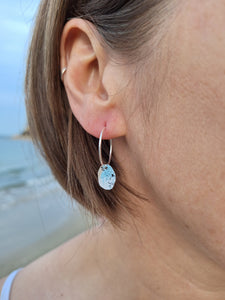 Sterling Silver beach rock lichen inspired hoop earrings with blue, white and black powder coating. Handmade in Tasmania by Karen Visagie from Hulley Jewellery
