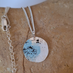 Load image into Gallery viewer, Blue white and black crustose inspired necklace. Sterling silver and powder coat.
