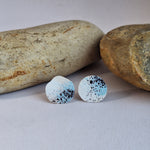 Load image into Gallery viewer, Sterling Silver beach rock lichen inspired stud earrings with blue, white and black powder coating. Handmade in Tasmania by Karen Visagie from Hulley Jewellery
