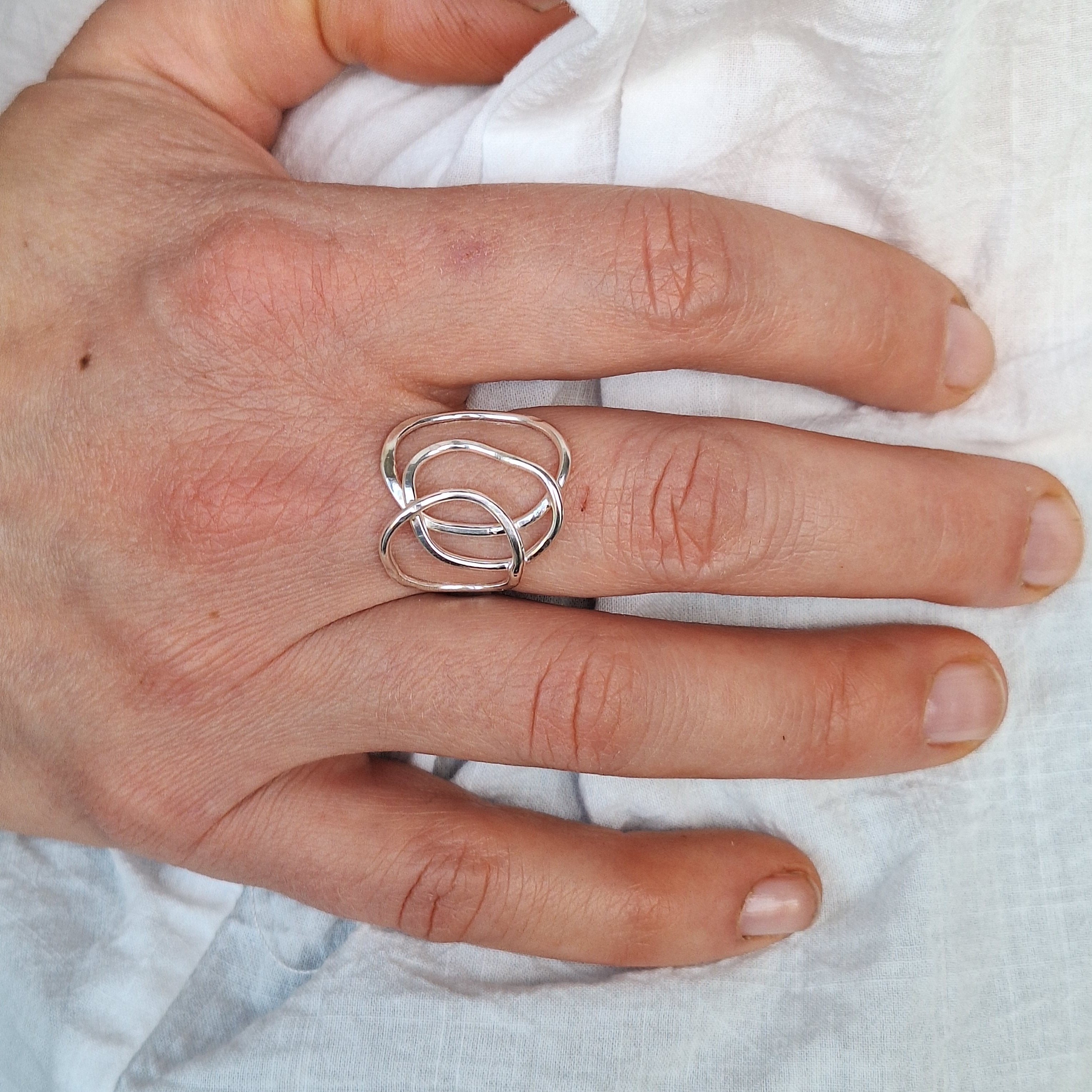 Sterling Silver organic shape and texture Beach Boulder ring handmade in Tasmania by Karen Visagie from Hulley Jewellery