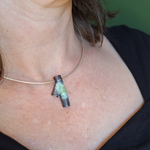 Load image into Gallery viewer, Oxidiszed Sterling silver forest lichen inspired branch necklace with powder coat finish on model
