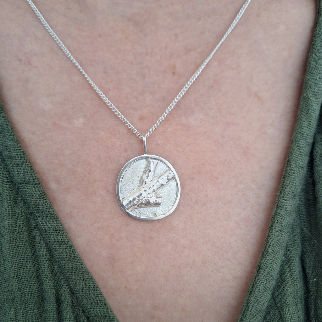 Forest inspired sterling silver necklace with branch design on neck. Nature inspired jewellery By Hulley Jewellery