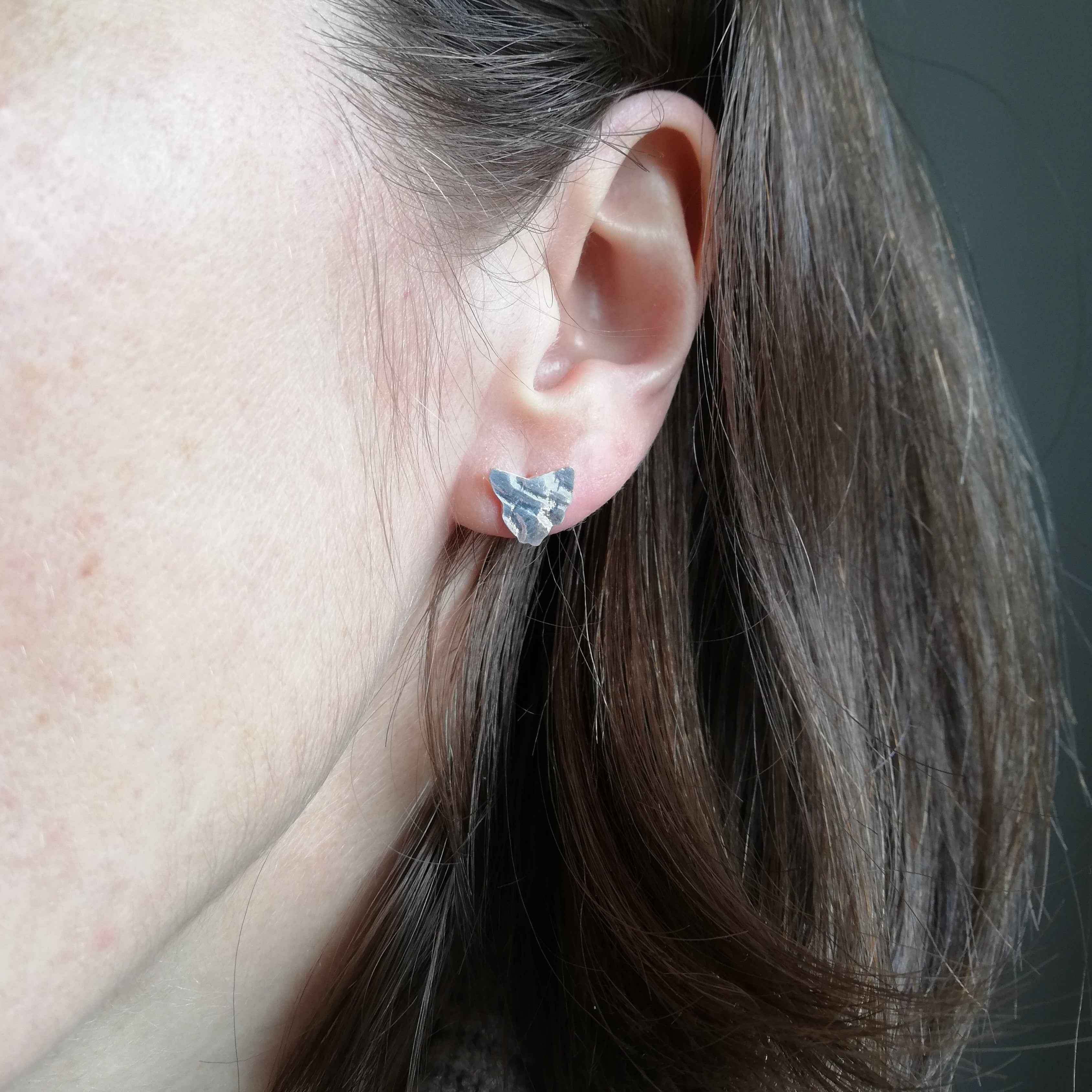 Sterling silver Tasmania studs on ear